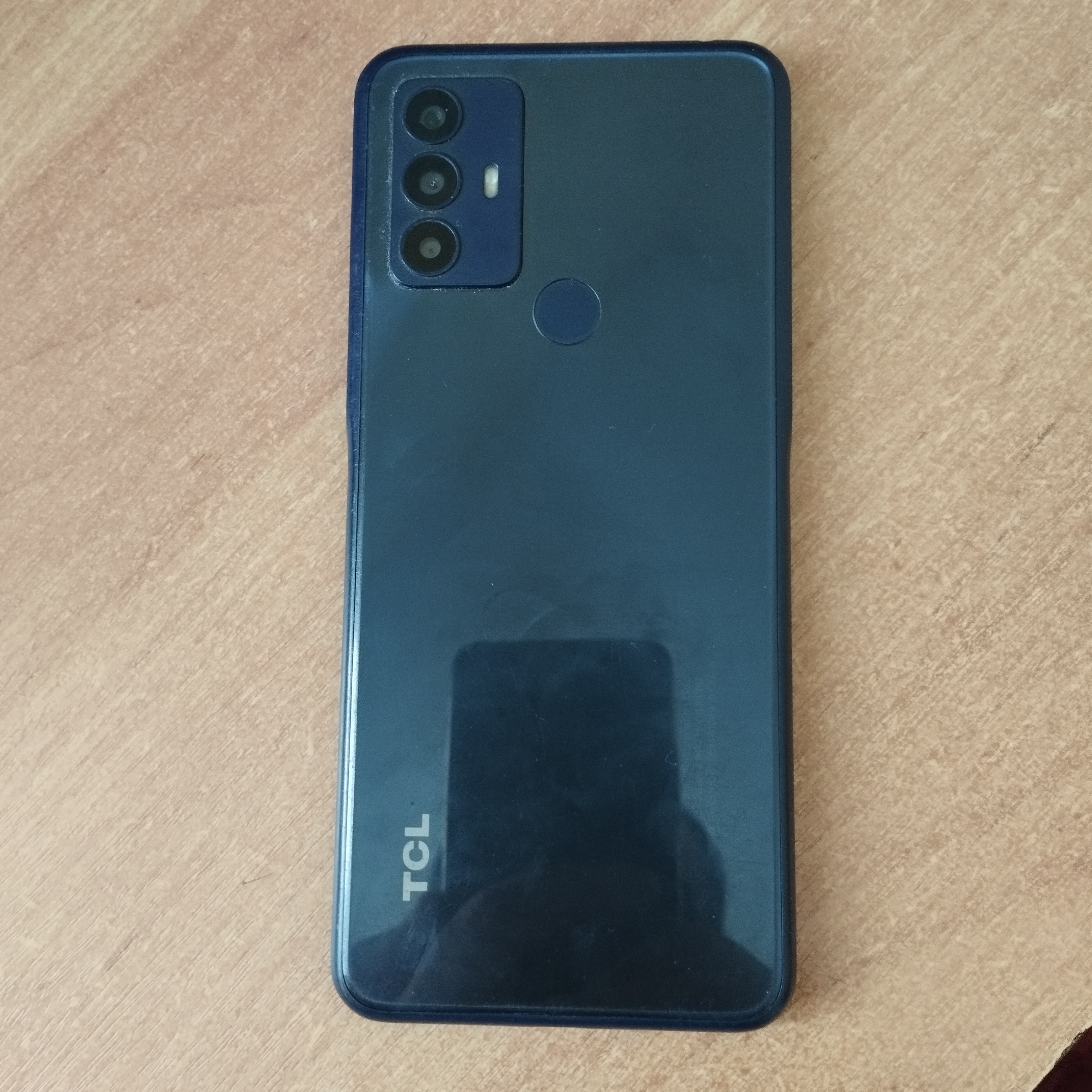 Мобильный телефон TCL (установлен по корпусу телефона). imei: 352555507267166 (установлен по слоту s