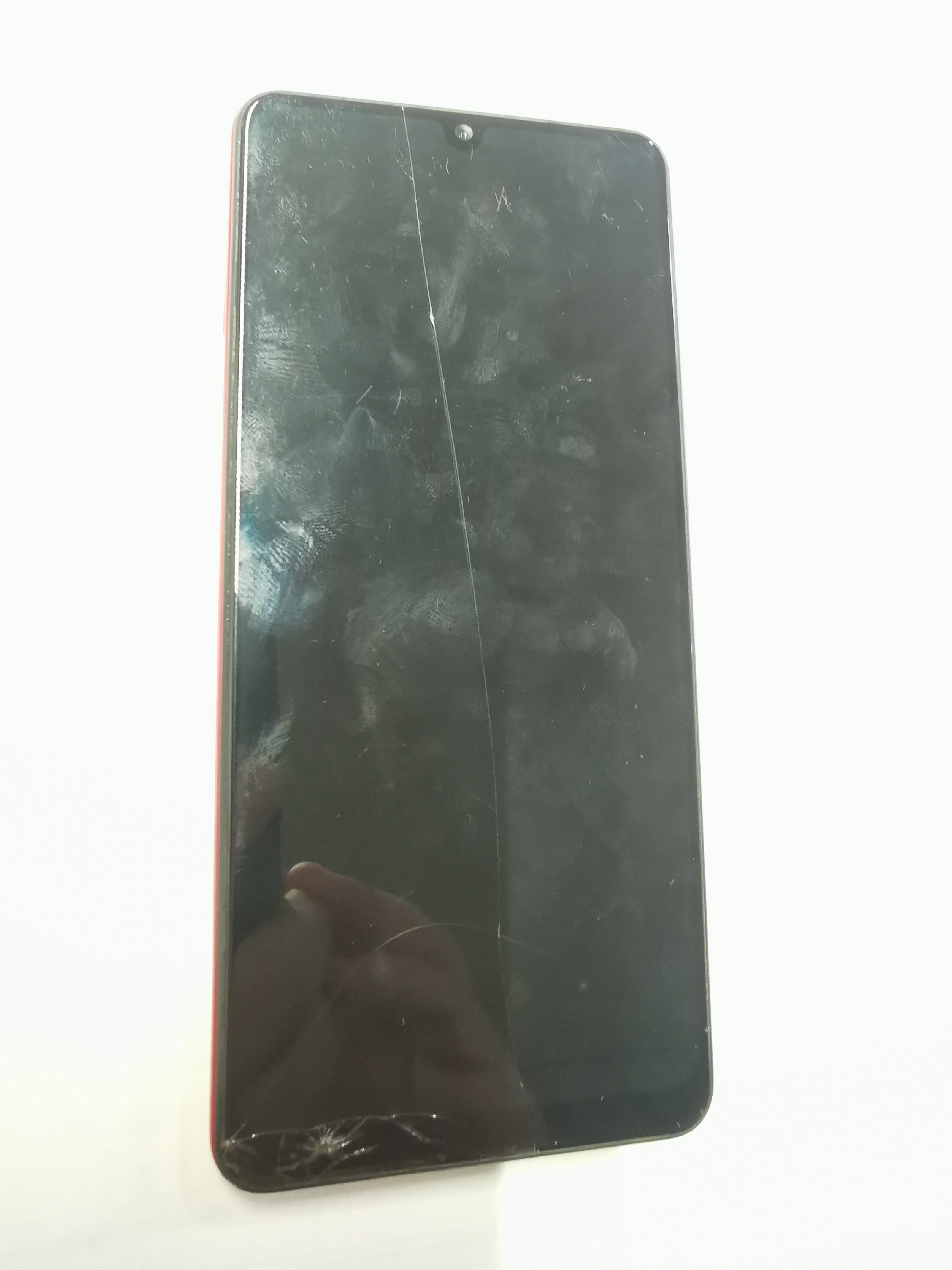 Мобильный телефон Samsung Galaxy A31 (память 128 ГБ. IMEI1: 356268113509346. IMEI2: 356269113509344. в корпусе красного цвета. бывший в употреблении. в рабочем состоянии. Дефекты: на экране трещины и сколы. на корпусе сколы. царапины и потертости.Пар...